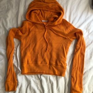 Cropped TNA hoodie from Aritzia